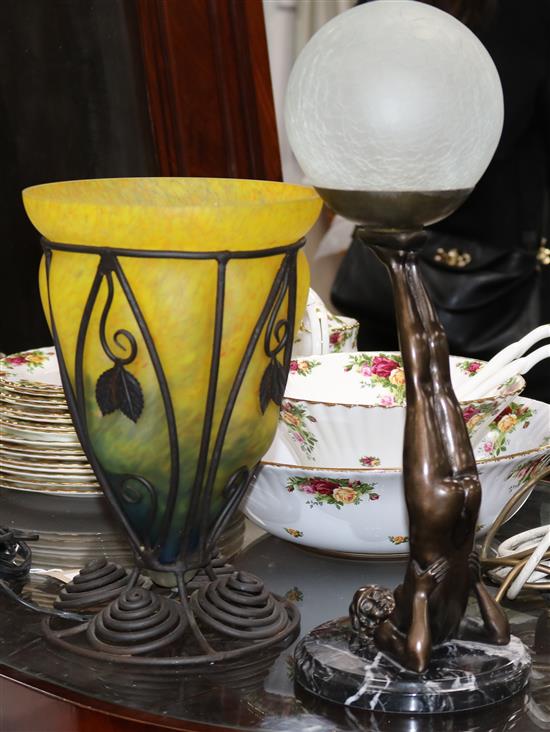 An Art Deco style figural lamp on marble base and an Art Nouveau style iron and glass lamp tallest 43cm